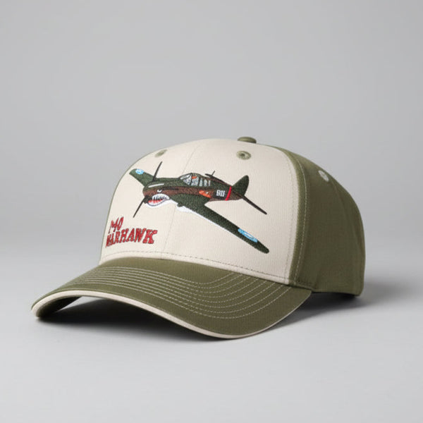 Baseball cap with airplane design on a gray background