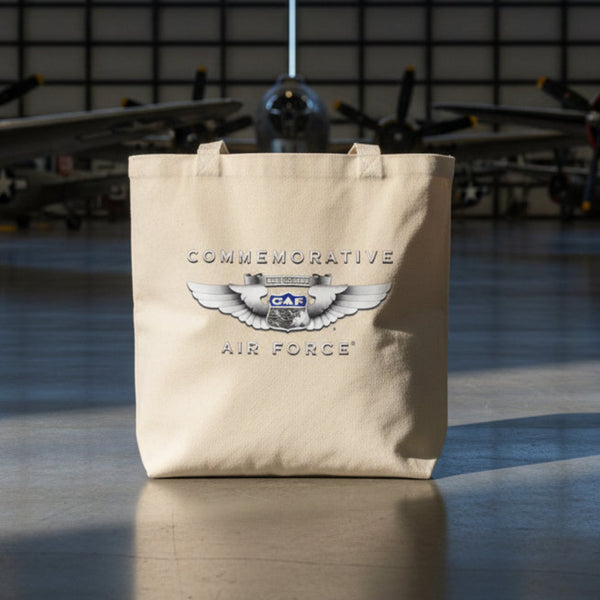 Beige tote bag with Commemorative Air Force logo and text on a light background
