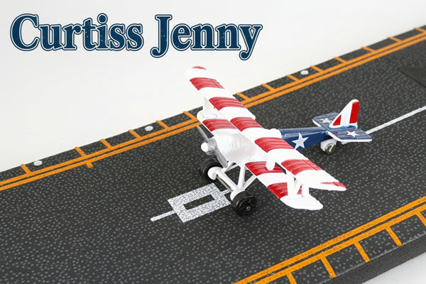 Model airplane with American flag design on a track-like surface
