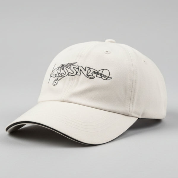 White cap with a Cessna logo 