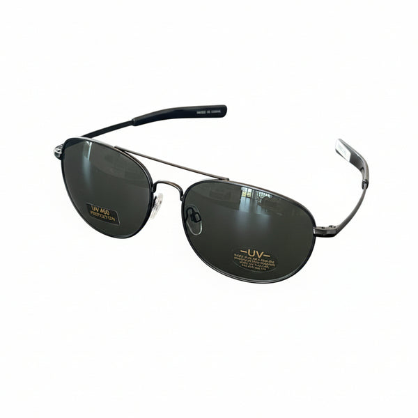 Sunglasses on a dark surface with a blurred background