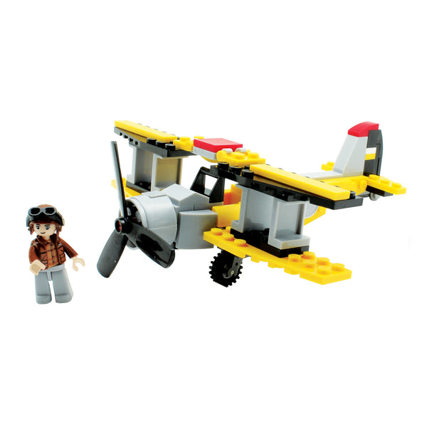Toy airplane and figure on a white background