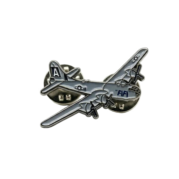 A silver-toned metal lapel pin shaped like a B29 Superfortress named FIFI